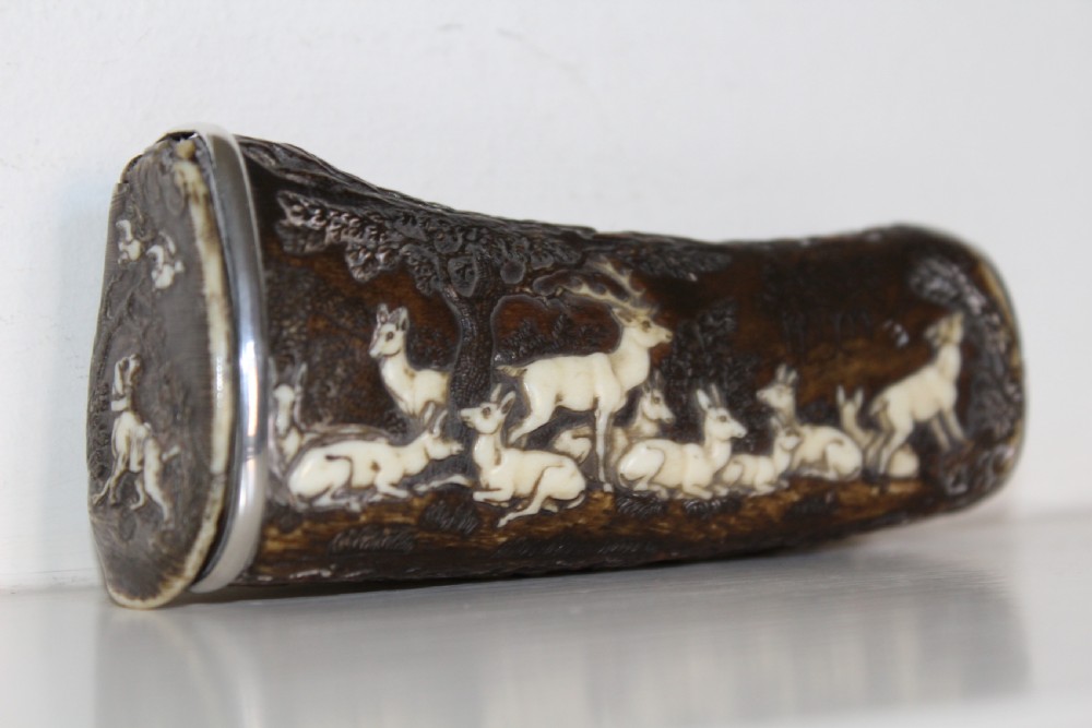 A superb and delightfully carved 19th century antler powder flask Comes with a letter of provenance View III