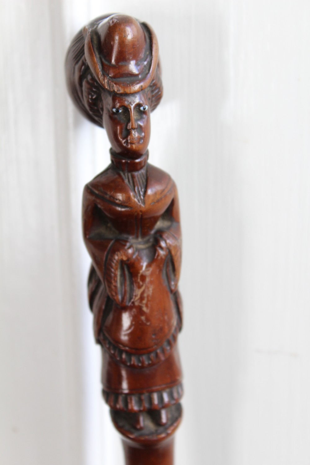 A superbly carved walking stick carved from one piece of wood View II