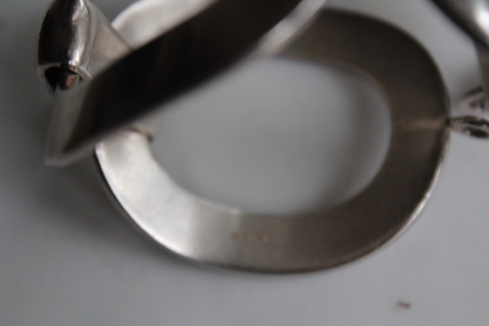 A very stylish and heavy gauge chunky silver hand made bracelet  View VI