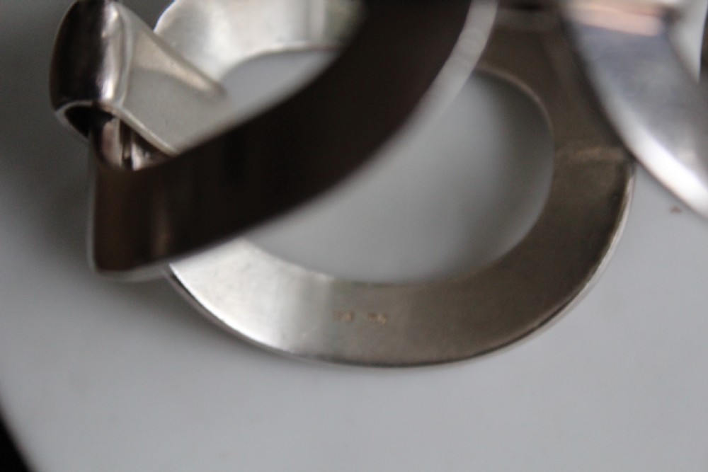 A very stylish and heavy gauge chunky silver hand made bracelet  View VII
