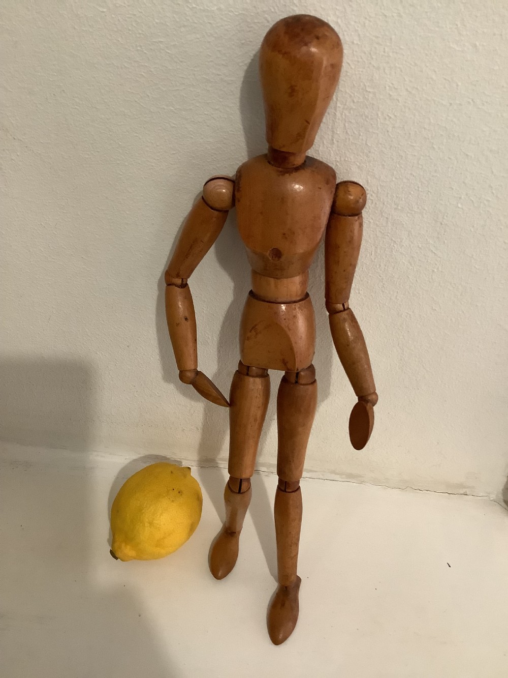 A well carved wood artists lay figure