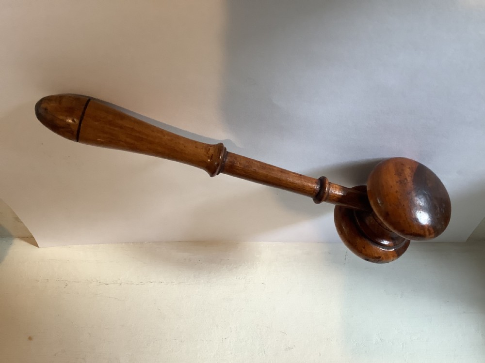 A very finely turned and carved rosewood gavel View III