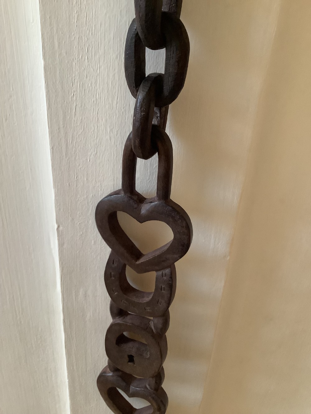 A very intricately carved Welsh love spoon carved from one piece of wood View II