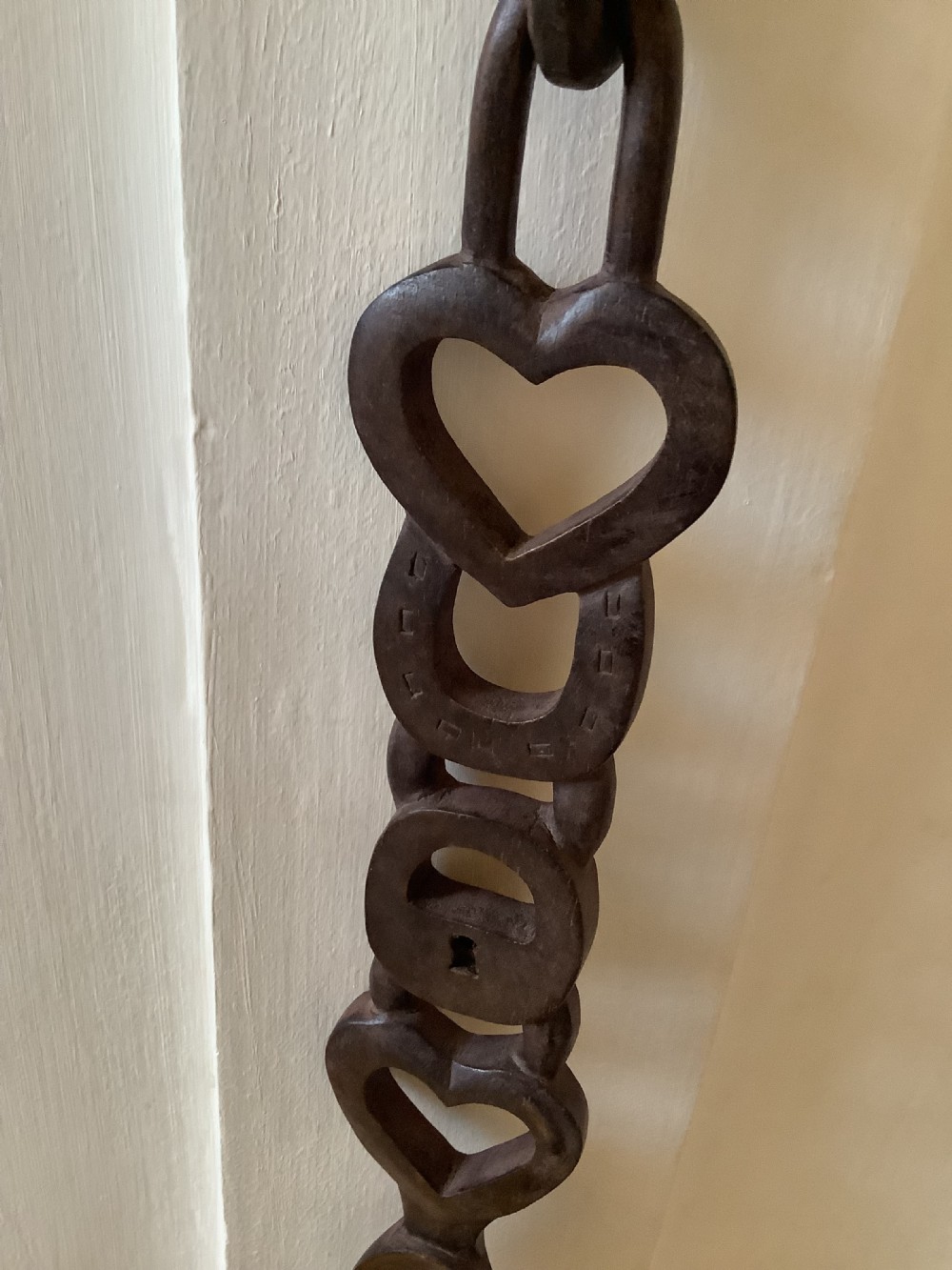 A very intricately carved Welsh love spoon carved from one piece of wood View III