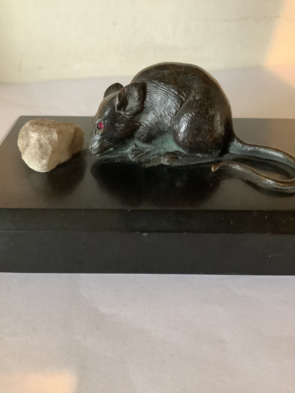 A delightful and charming bronze mouse paperweight on a black marble base  View III