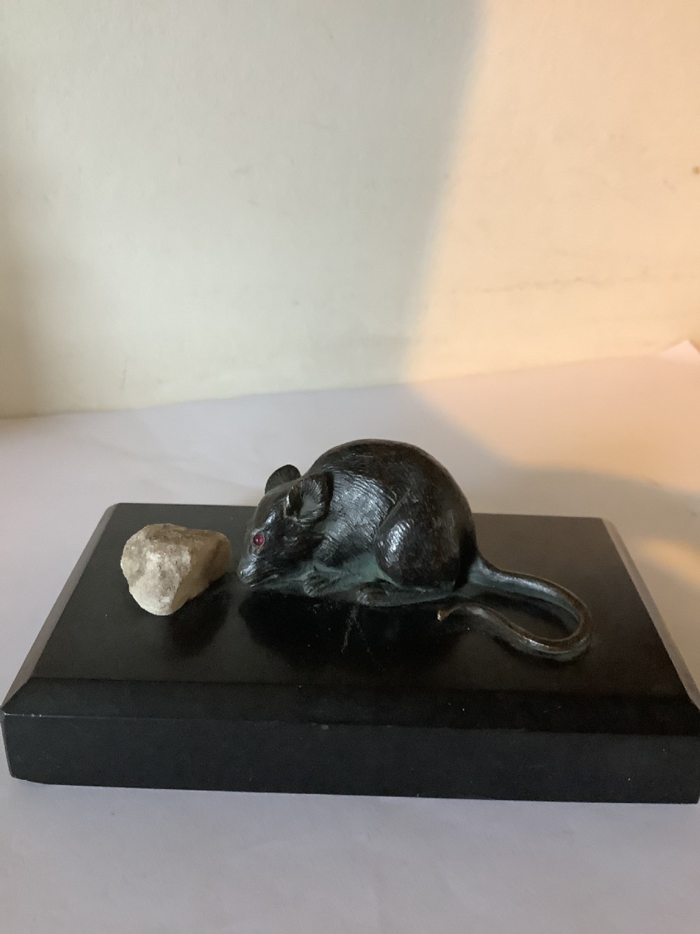 A delightful and charming bronze mouse paperweight on a black marble base  View V