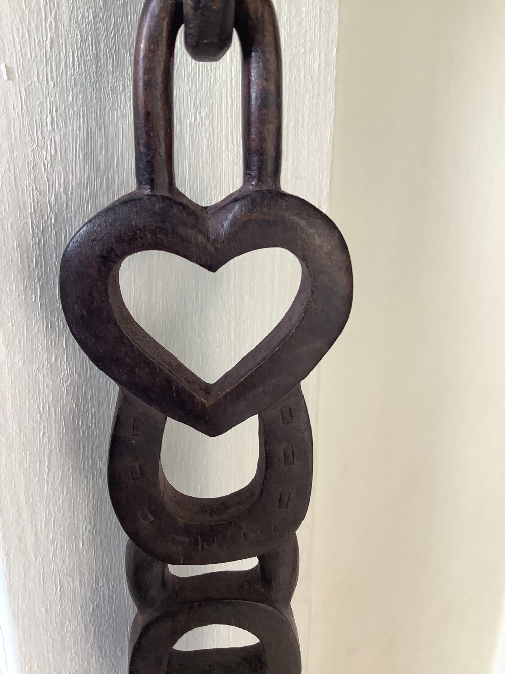 A very intricately carved wood Welsh love spoon carved from one piece of wood View IV