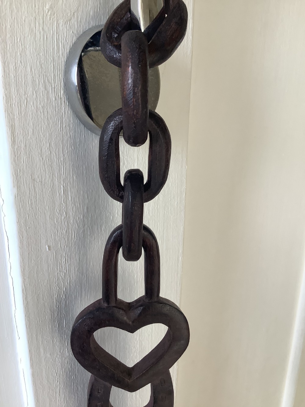 A very intricately carved wood Welsh love spoon carved from one piece of wood View V