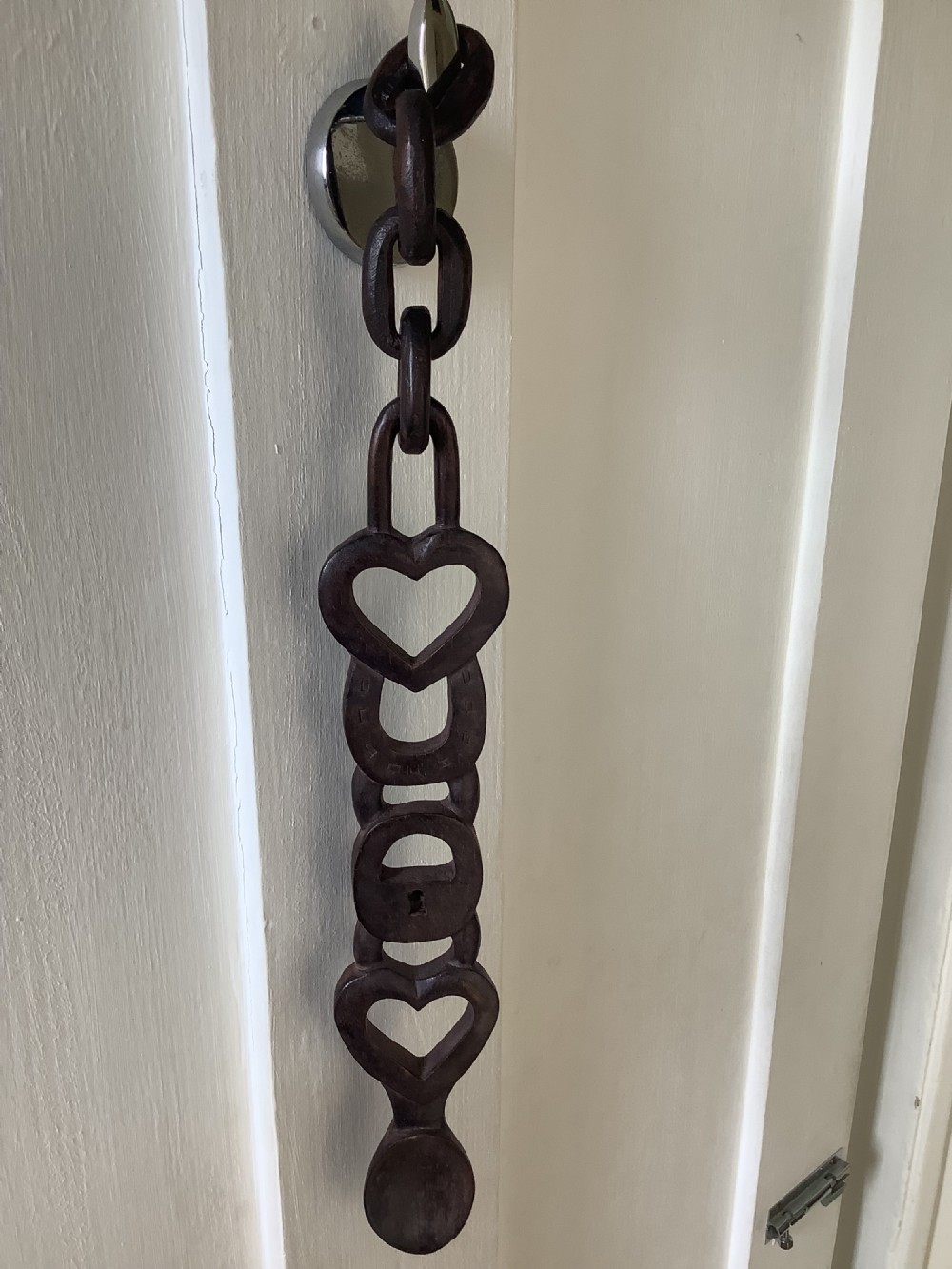 A very intricately carved wood Welsh love spoon carved from one piece of wood View VII