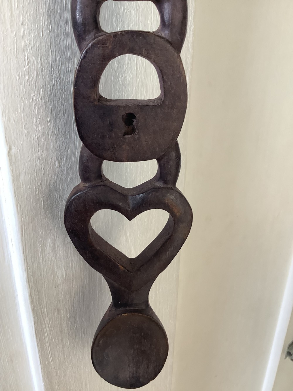 A very intricately carved wood Welsh love spoon carved from one piece of wood View IX