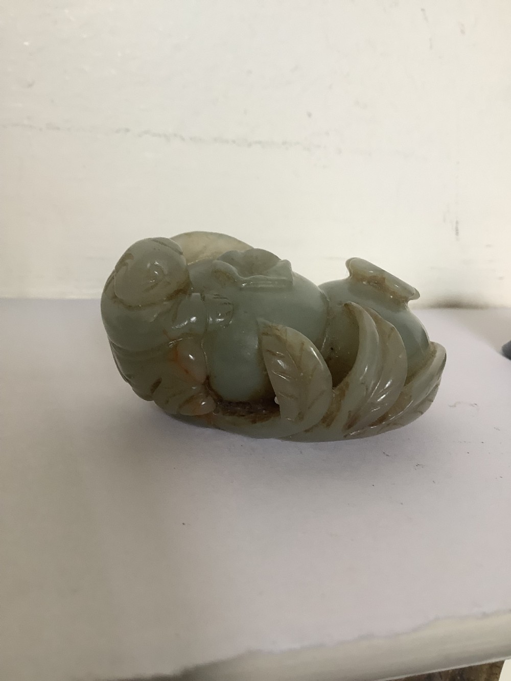 A superb and finely carved celadon jade piece 