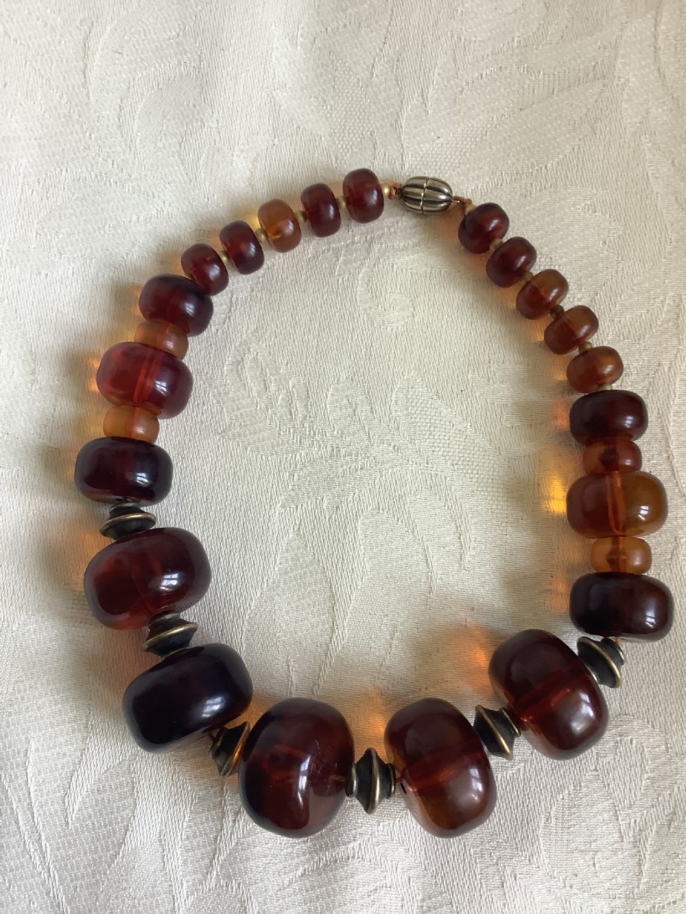 A large and chunky very wearable cherry amber necklace