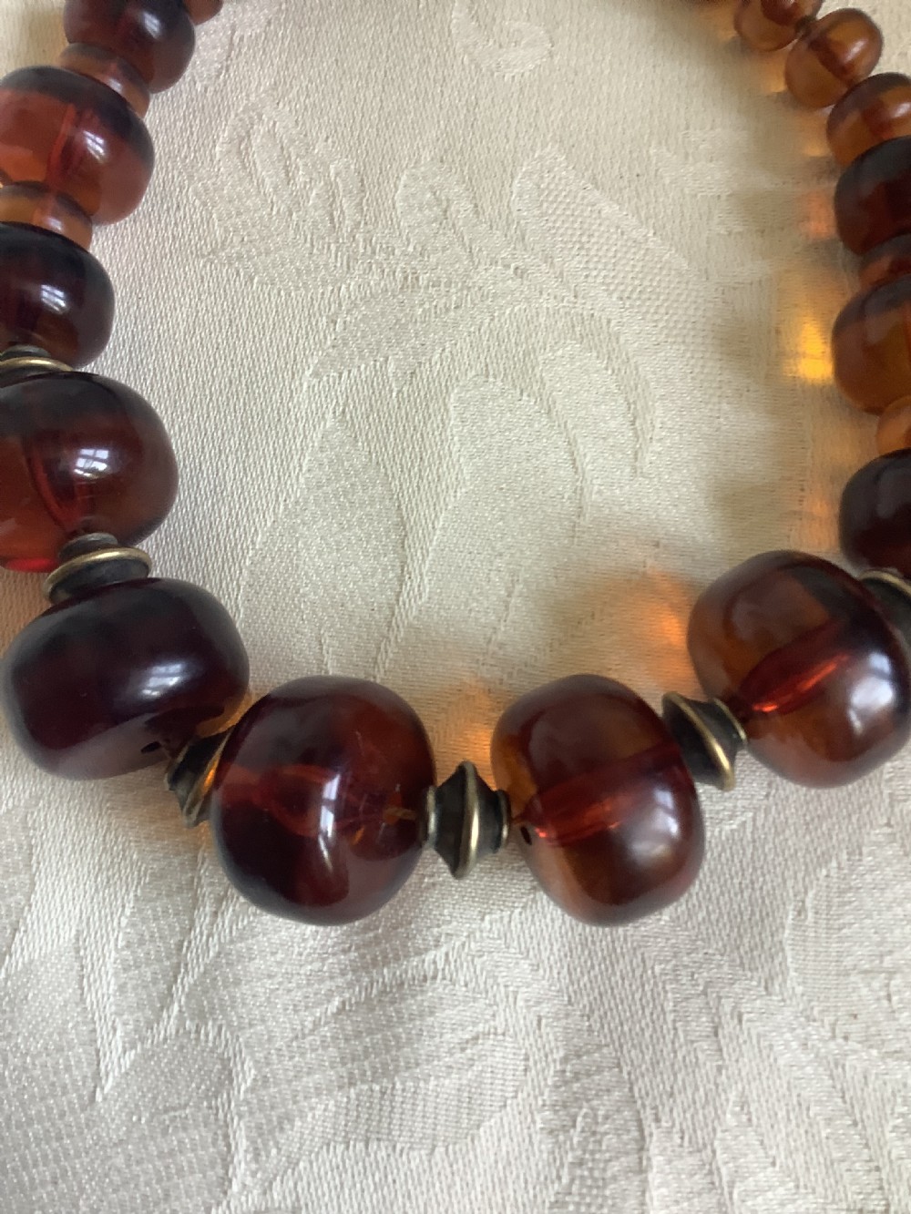 A large and chunky very wearable cherry amber necklace View II