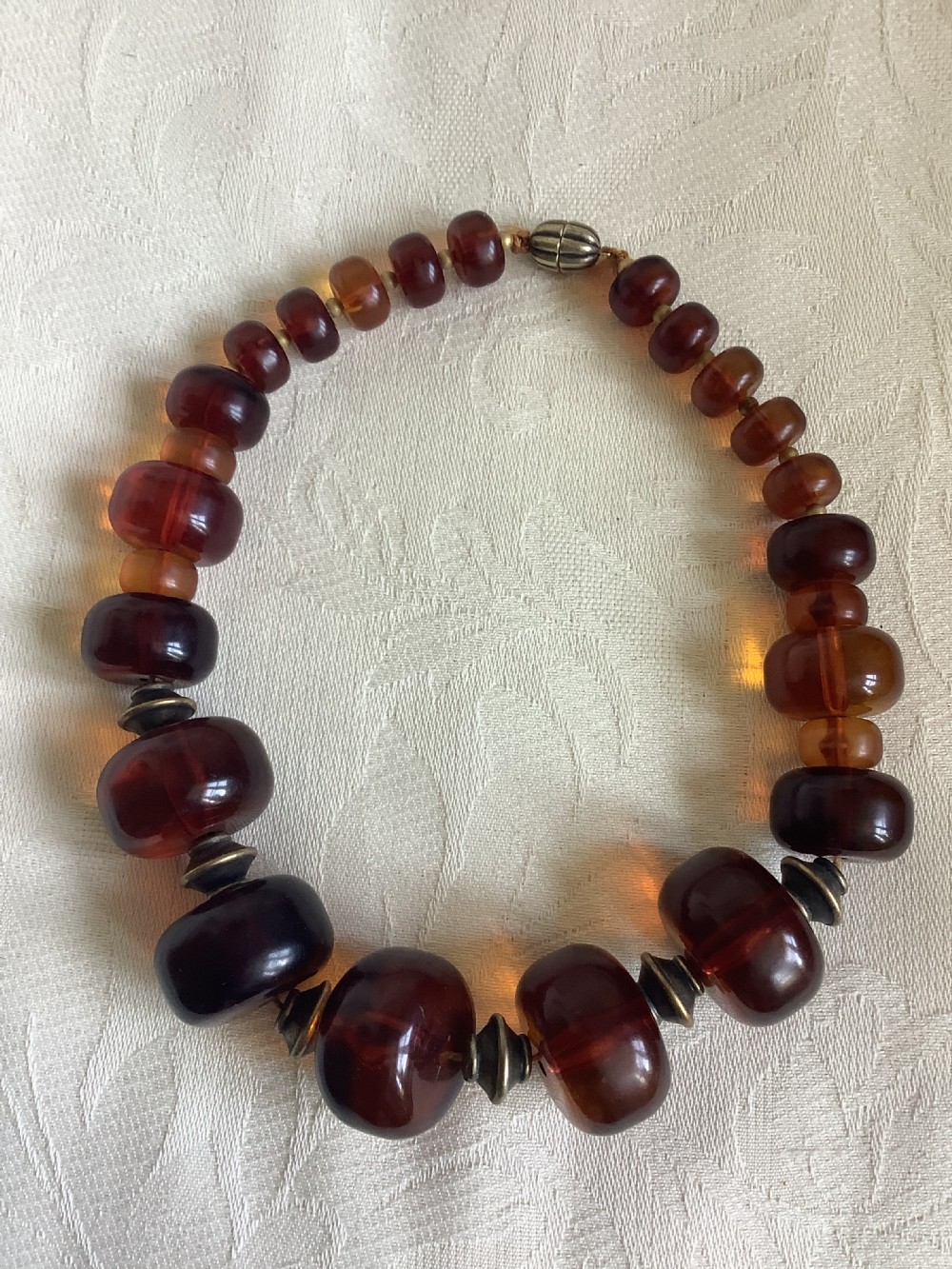 A large and chunky very wearable cherry amber necklace View III