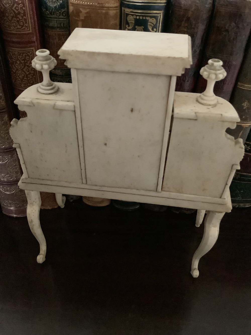 A miniature French carved bone boudoir suite featuring an ornate dressing table with mirror, a matching stool, and two side chairs with intricate pierced backs. View VI