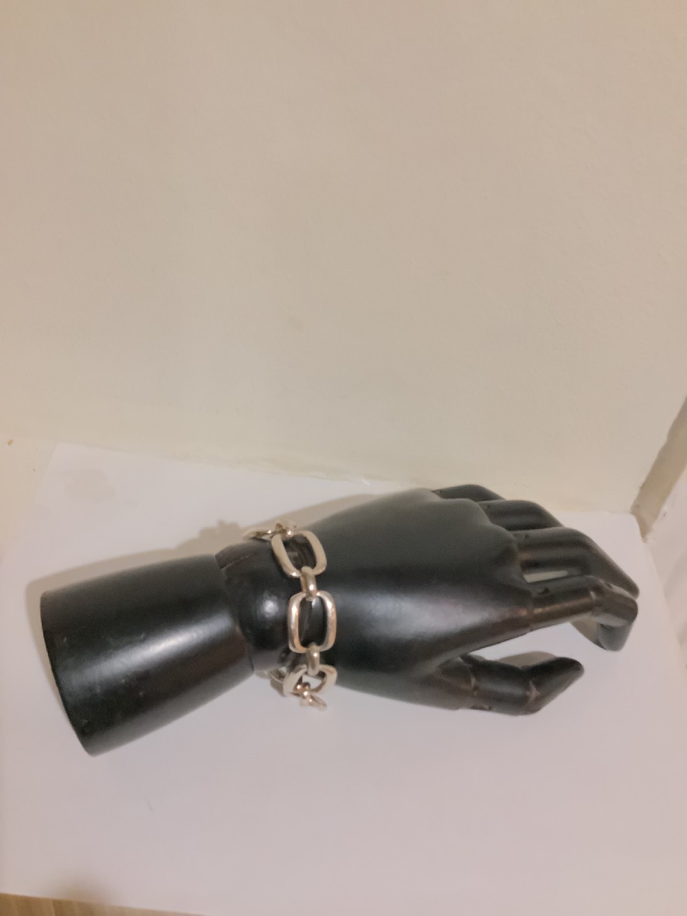 An Art Deco silver chain link bracelet featuring elongated openwork rectangular links. View VI