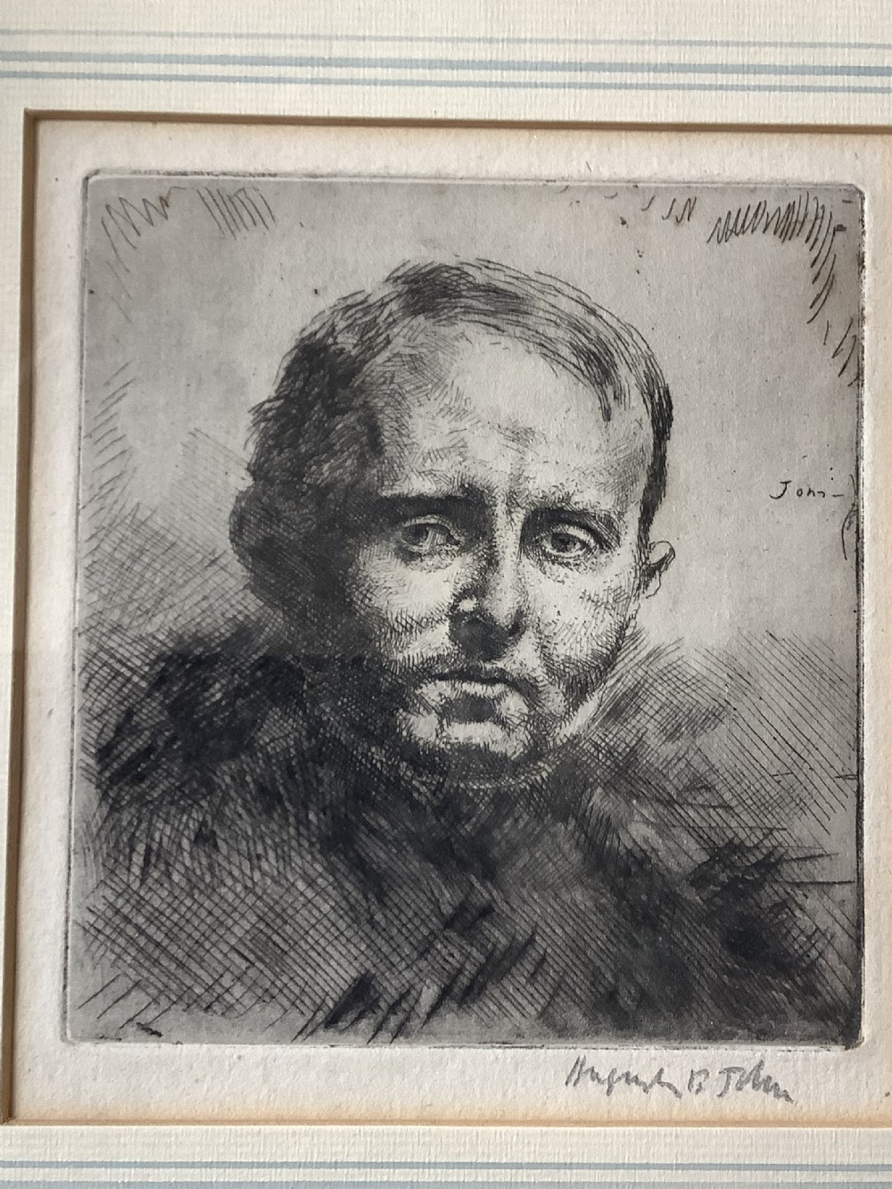 A framed monochrome portrait etching of a mans head executed with dense cross-hatching and signed in pencil beneath the plate mark. View IV