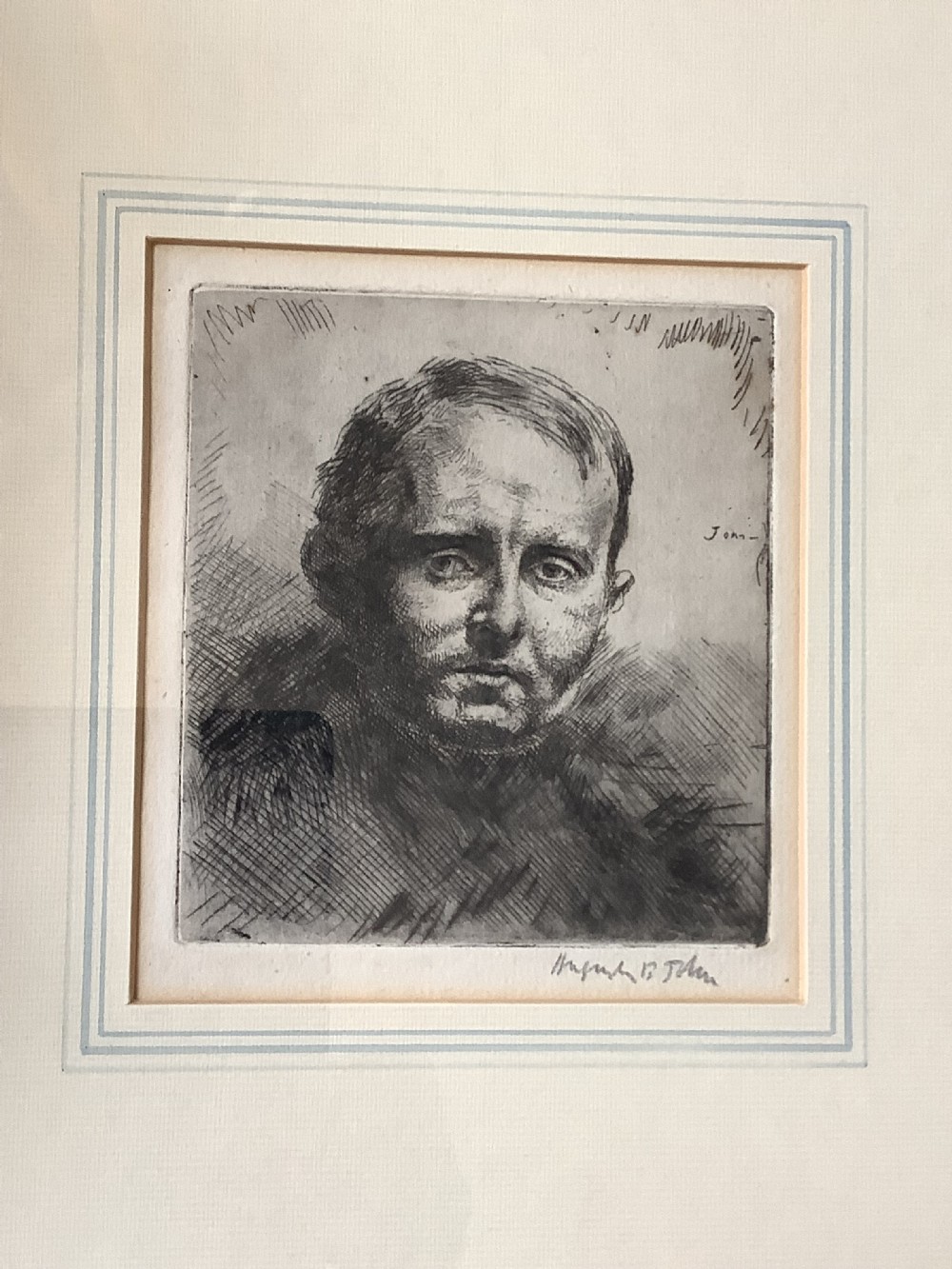 A framed monochrome portrait etching of a mans head executed with dense cross-hatching and signed in pencil beneath the plate mark. View VIII