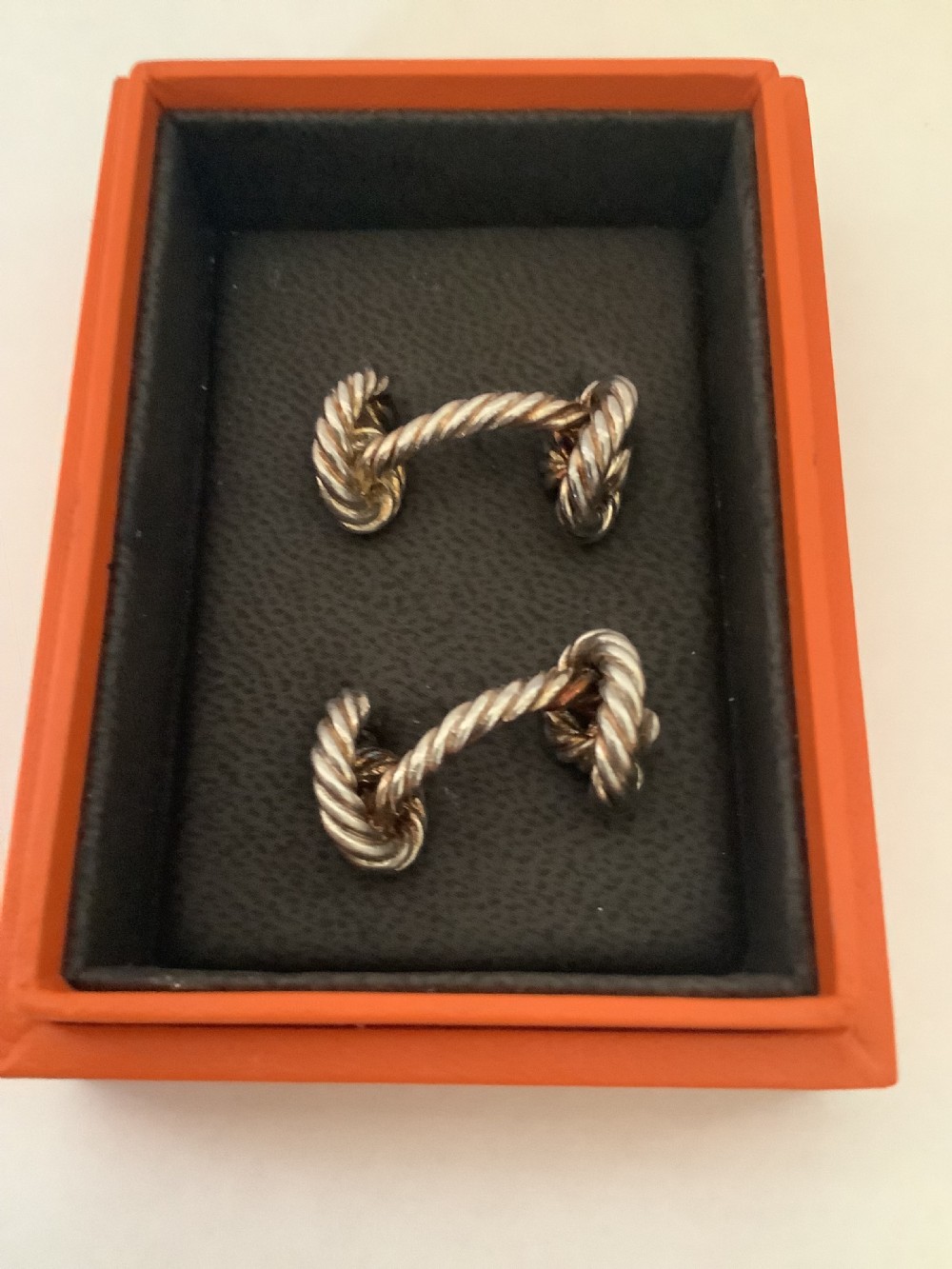 A pair of very stylish pre- owned Hermes silver cufflinks 