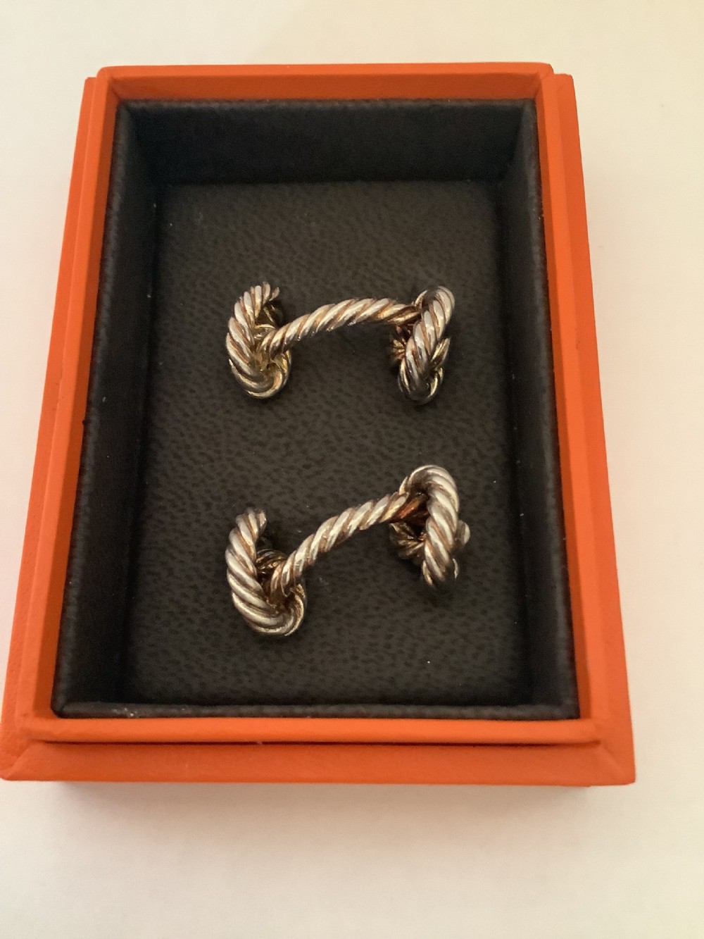 A pair of very stylish pre- owned Hermes silver cufflinks  View V