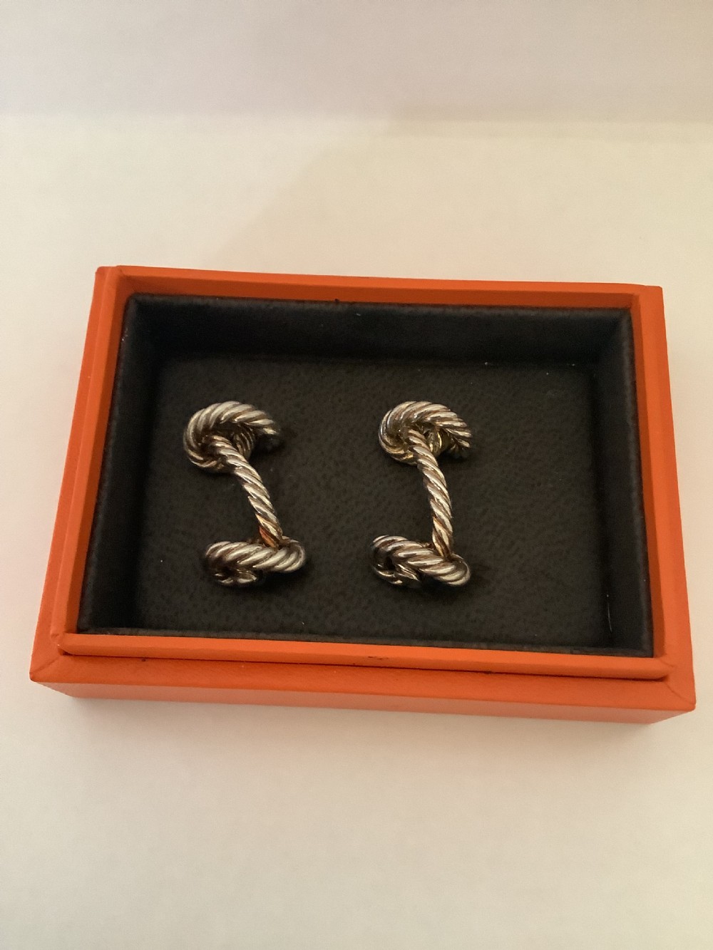 A pair of very stylish pre- owned Hermes silver cufflinks  View VII