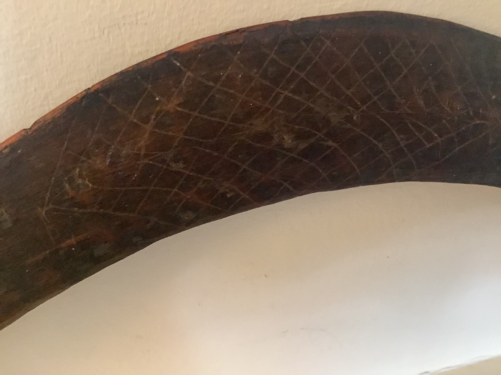 A fine antique hand carved Aboriginal boomerang deep dark rich patina. View II