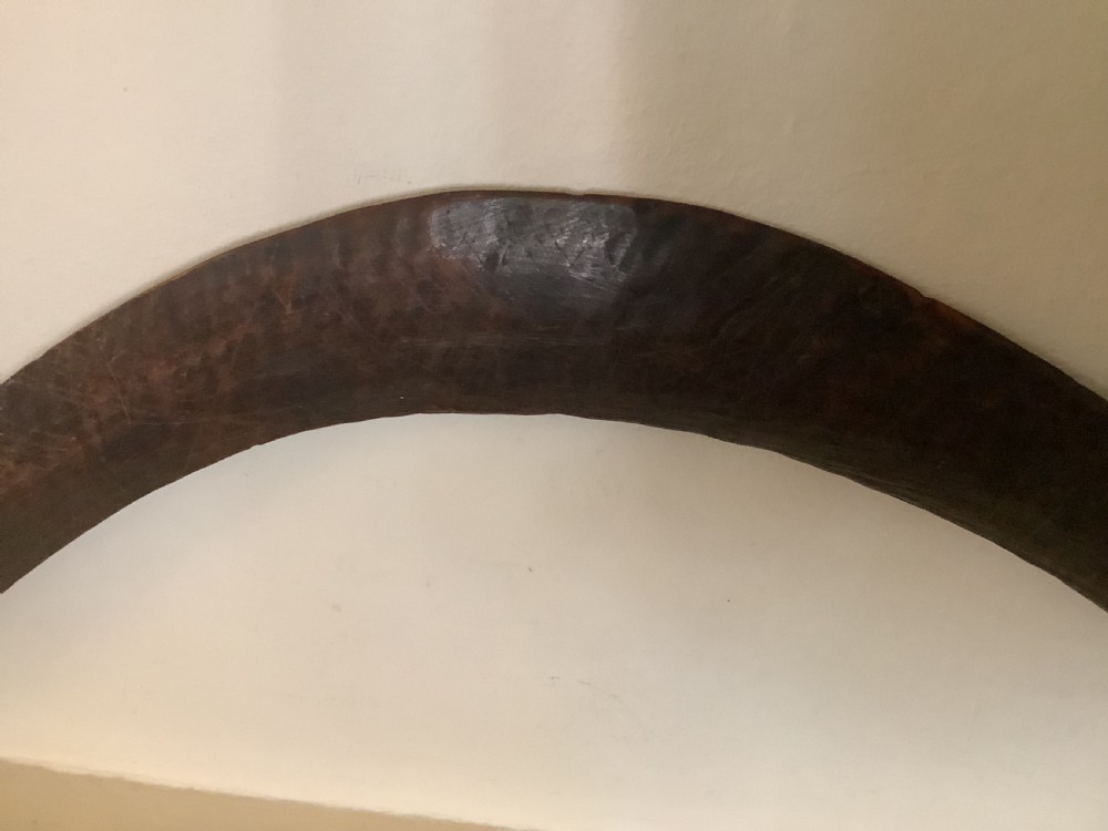 A fine antique hand carved Aboriginal boomerang deep dark rich patina. View III