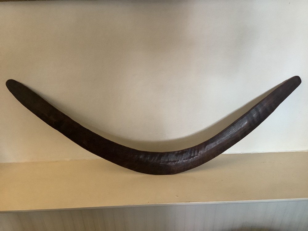 A fine antique hand carved Aboriginal boomerang deep dark rich patina. View IV