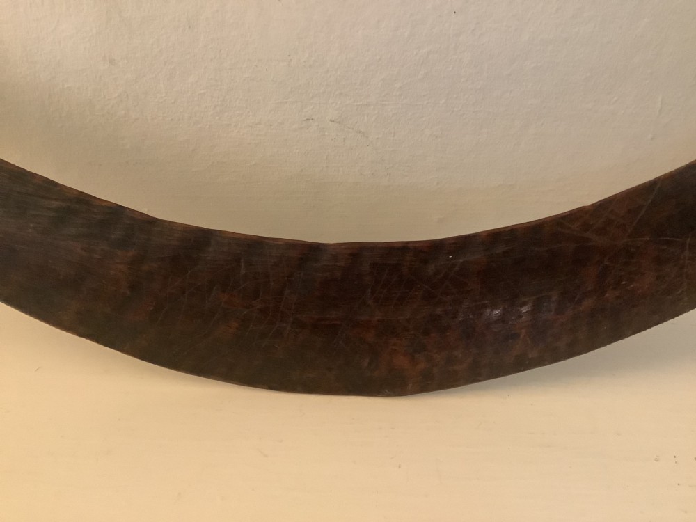 A fine antique hand carved Aboriginal boomerang deep dark rich patina. View VI