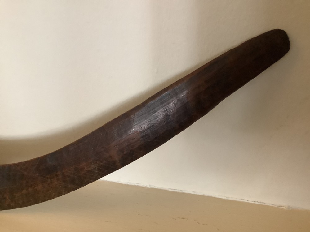 A fine antique hand carved Aboriginal boomerang deep dark rich patina. View VII