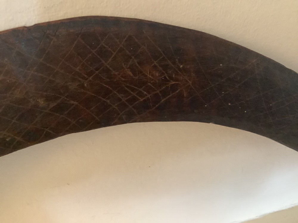 A fine antique hand carved Aboriginal boomerang deep dark rich patina. View IX