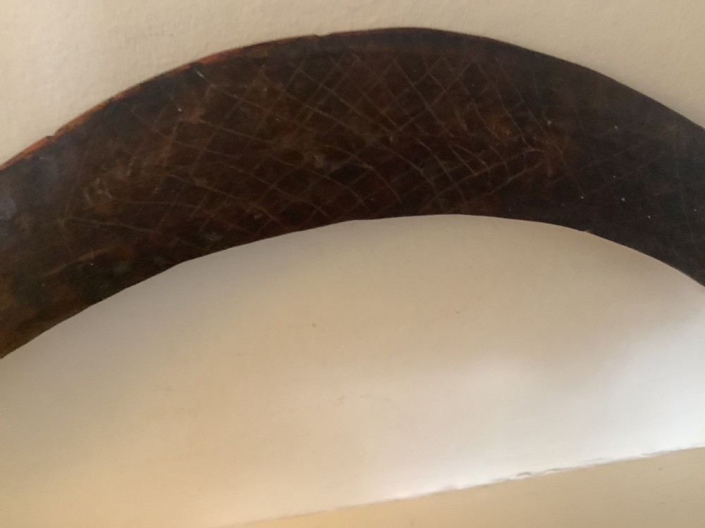 A fine antique hand carved Aboriginal boomerang deep dark rich patina. View X