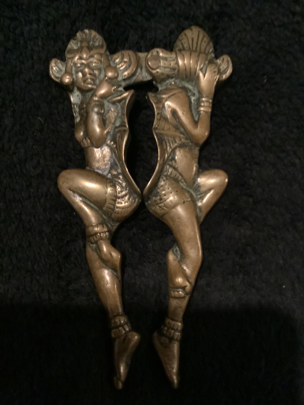 A cast brass novelty nutcracker fashioned in the form of two articulated dancing female figures. View II