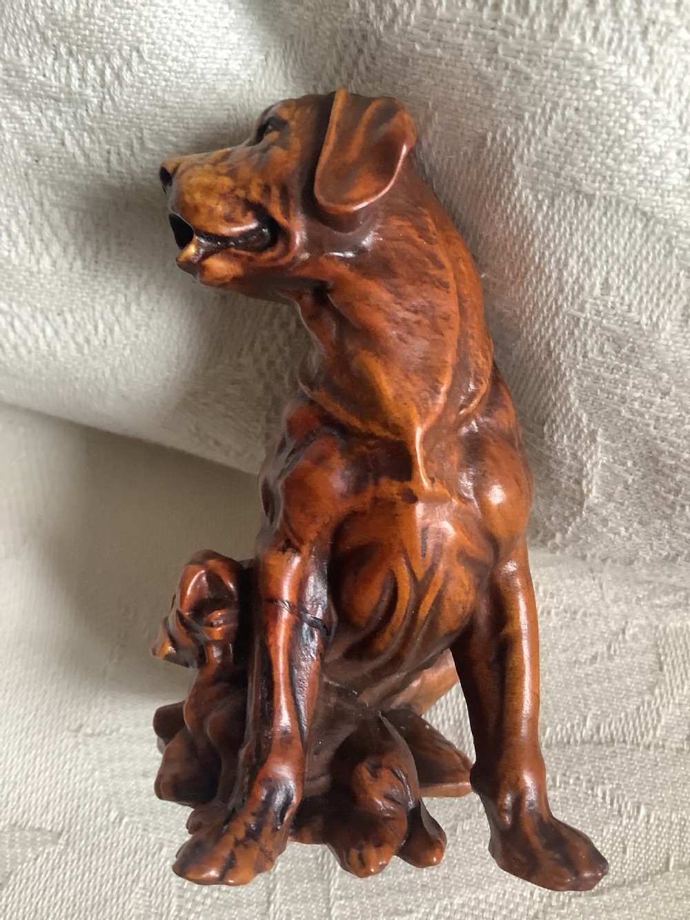 A very finely carved small hardwood figure of dog and pup View II