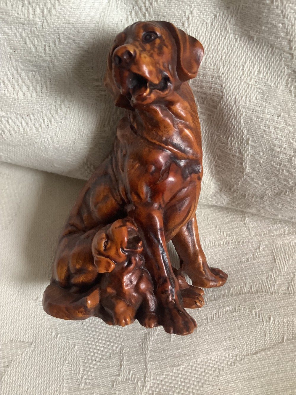 A very finely carved small hardwood figure of dog and pup View IV