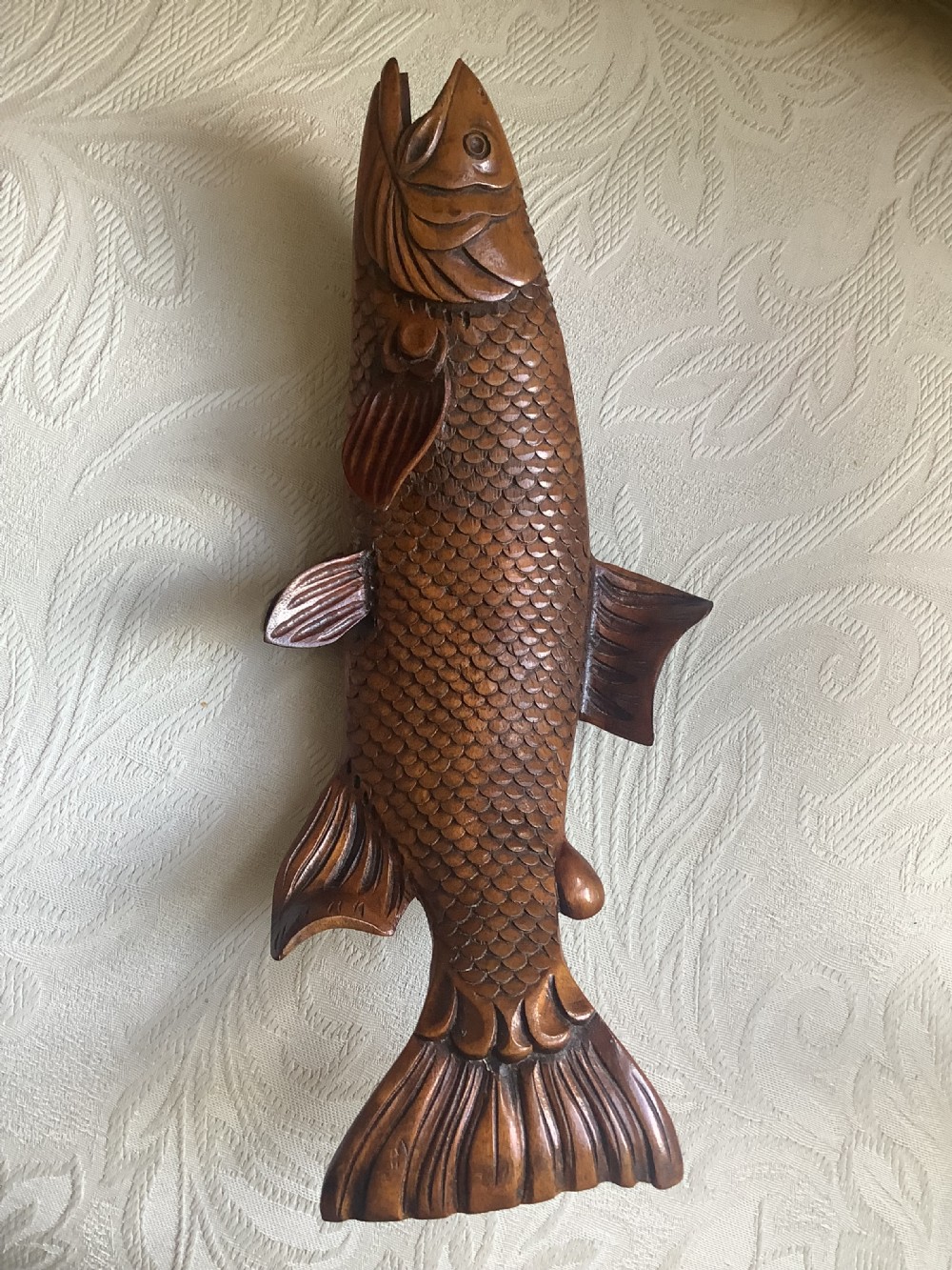 A very fine example of a hard wood fish carving