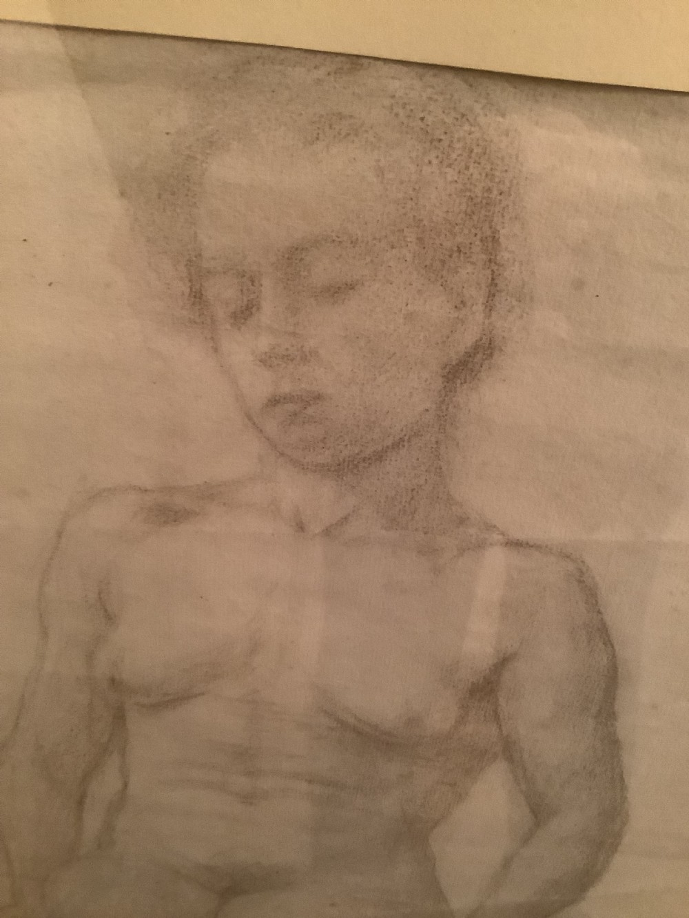 A framed graphite life study of a seated female nude figure on cream paper, set within a slender gilt frame. View V
