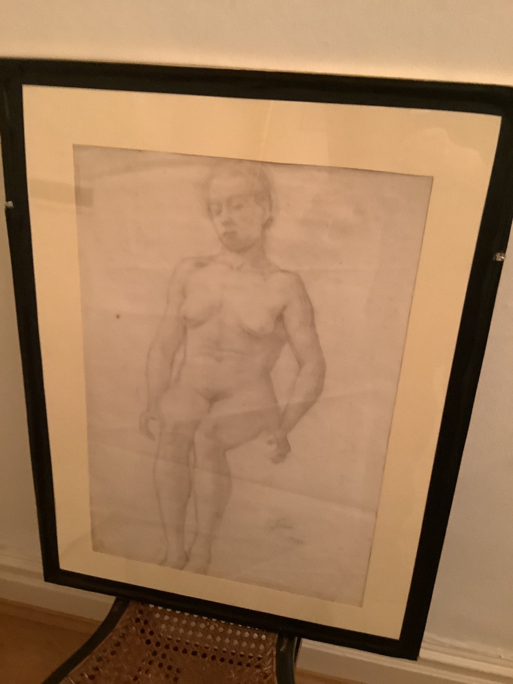 A framed graphite life study of a seated female nude figure on cream paper, set within a slender gilt frame. View VI