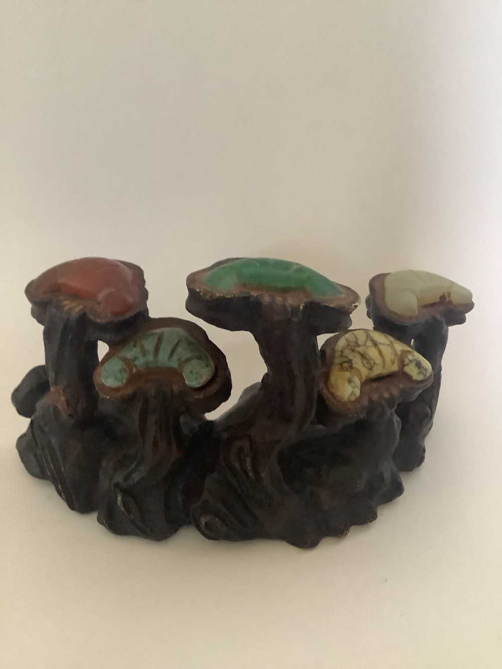 A 19th-century cast bronze Chinese scholars brush rest modelled in the form of lingzhi mushrooms with colourful inset hardstone caps. View V