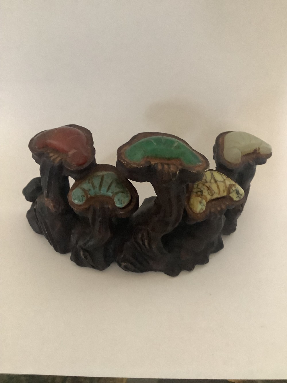 A 19th-century cast bronze Chinese scholars brush rest modelled in the form of lingzhi mushrooms with colourful inset hardstone caps. View VI