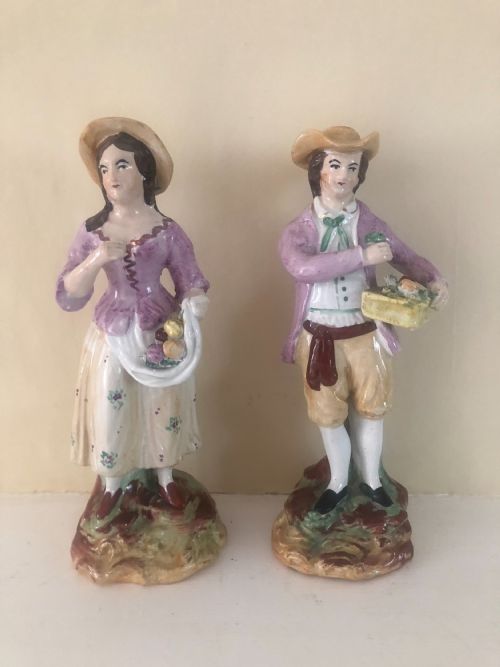 a pair of nineteenth century staffordshire pottery figures the fruit sellers - CATEGORY: ANTIQUE CERAMICS - DATED 19TH CENTURY