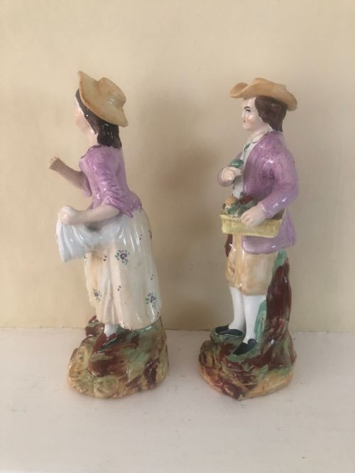 A PAIR OF NINETEENTH CENTURY STAFFORDSHIRE POTTERY FIGURES THE FRUIT SELLERS - ADDITIONAL PHOTO 2