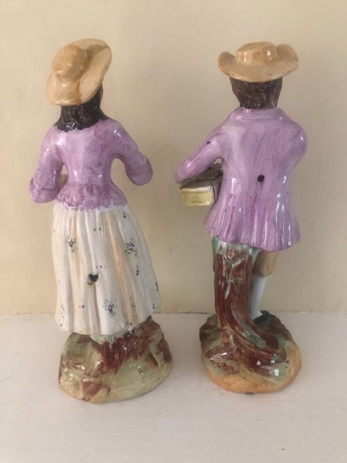 A PAIR OF NINETEENTH CENTURY STAFFORDSHIRE POTTERY FIGURES THE FRUIT SELLERS - ADDITIONAL PHOTO 3