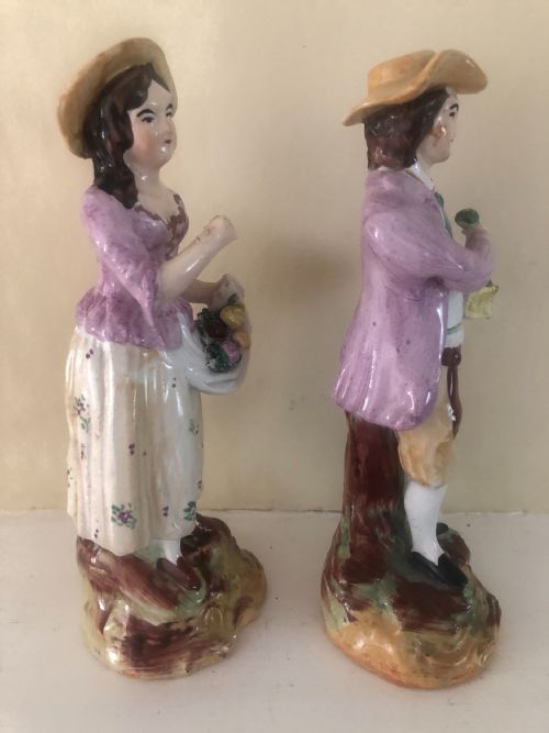 A PAIR OF NINETEENTH CENTURY STAFFORDSHIRE POTTERY FIGURES THE FRUIT SELLERS - ADDITIONAL PHOTO 4