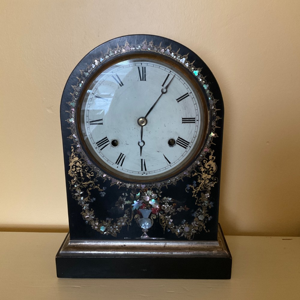 Beautiful Mantel Clock Ebonised with Mother-of Pearl with scrolling Floral Decoration.