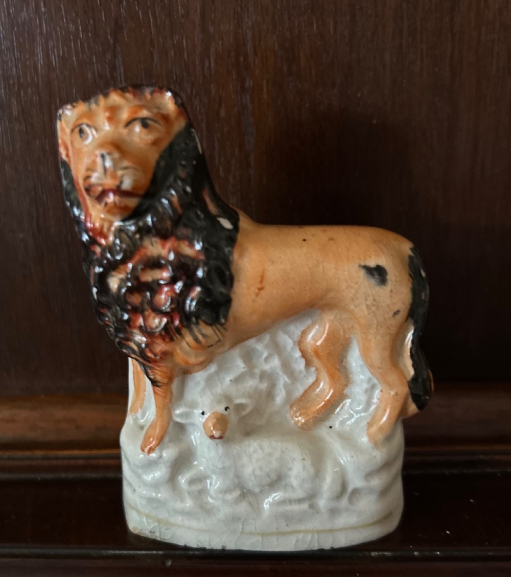 Staffordshire Pottery Figure of The Lion & The Lamb