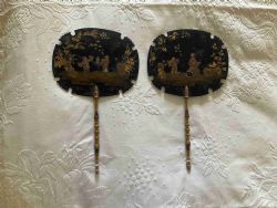 A PAIR OF PAPIERMACHE CHINOISERIE FACE SCREENS IN ORIENTAL STYLE