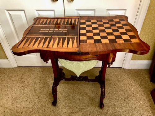 A Victorian Walnut Serpentine Shaped Games/work Table C. 1880