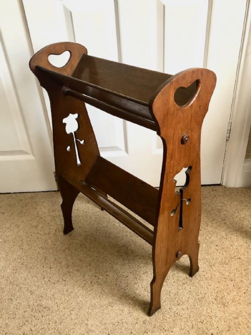 AN EDWARDIAN ARTS CRAFTS PALE OAK BOOK STAND - ADDITIONAL PHOTO 2