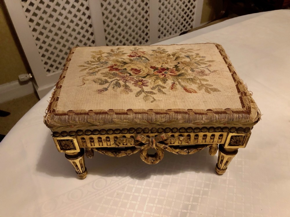 A Carved Giltwood and Upholstered Foot stool c 1860